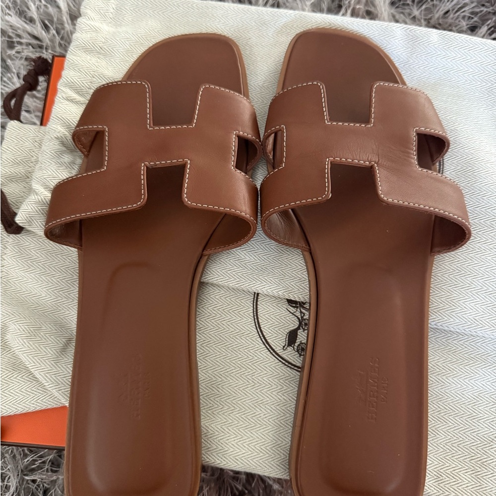 Hermes Gold Calfskin Oran Sandals with Iconic H Design